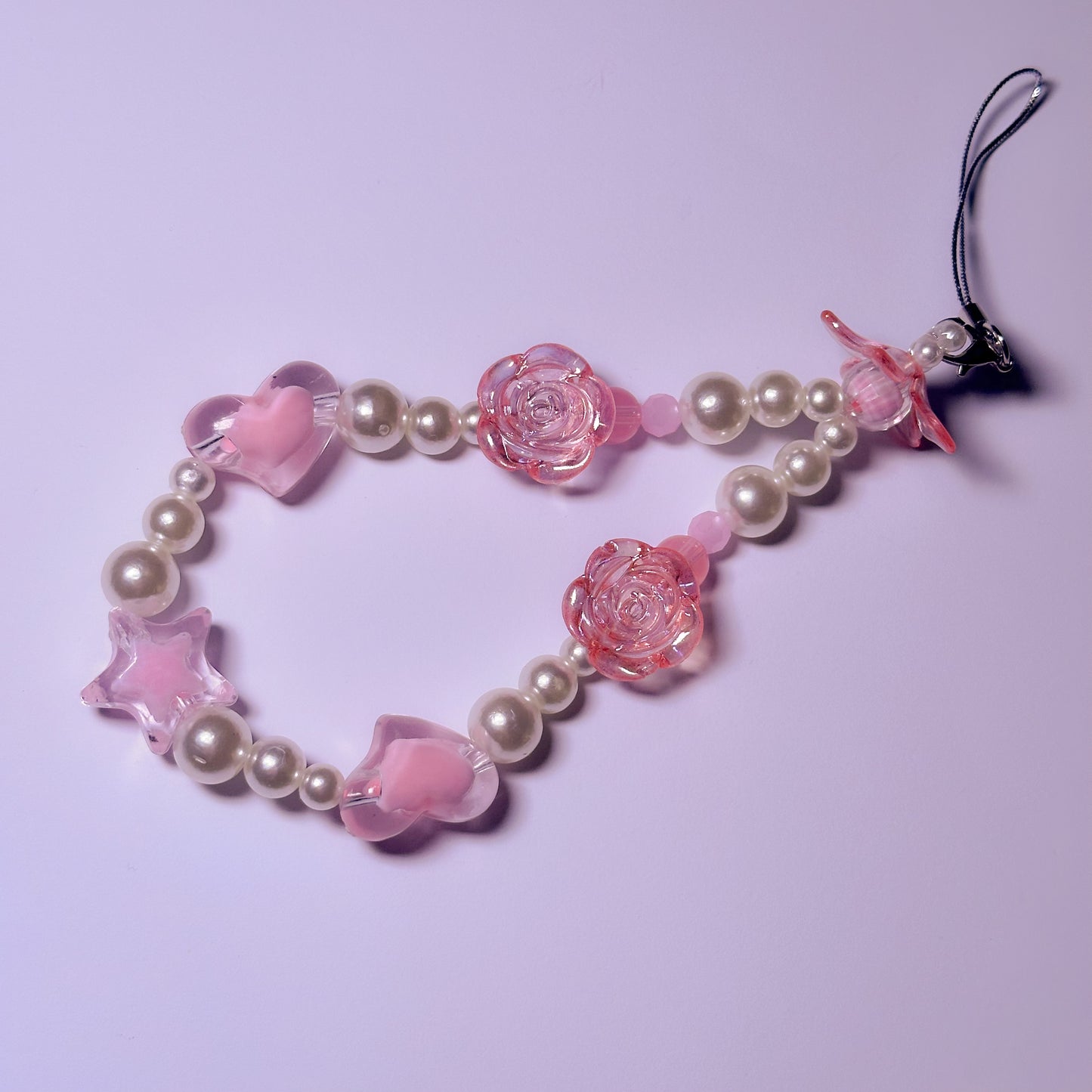 Handmade pink beaded phone charm