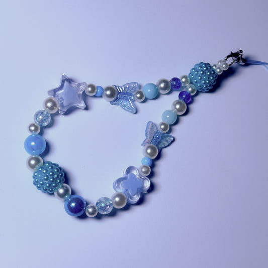 Handmade blue beaded phone charm